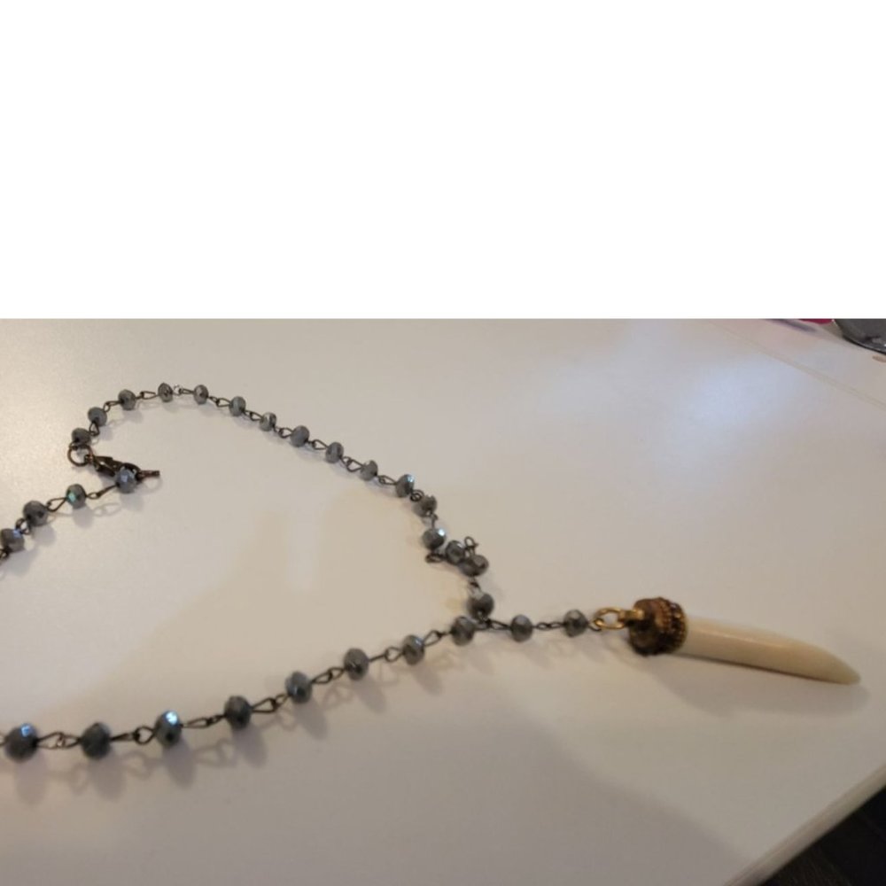 2-inch Bone pendant with Brass cap on a 17 in Grey Crystal chain